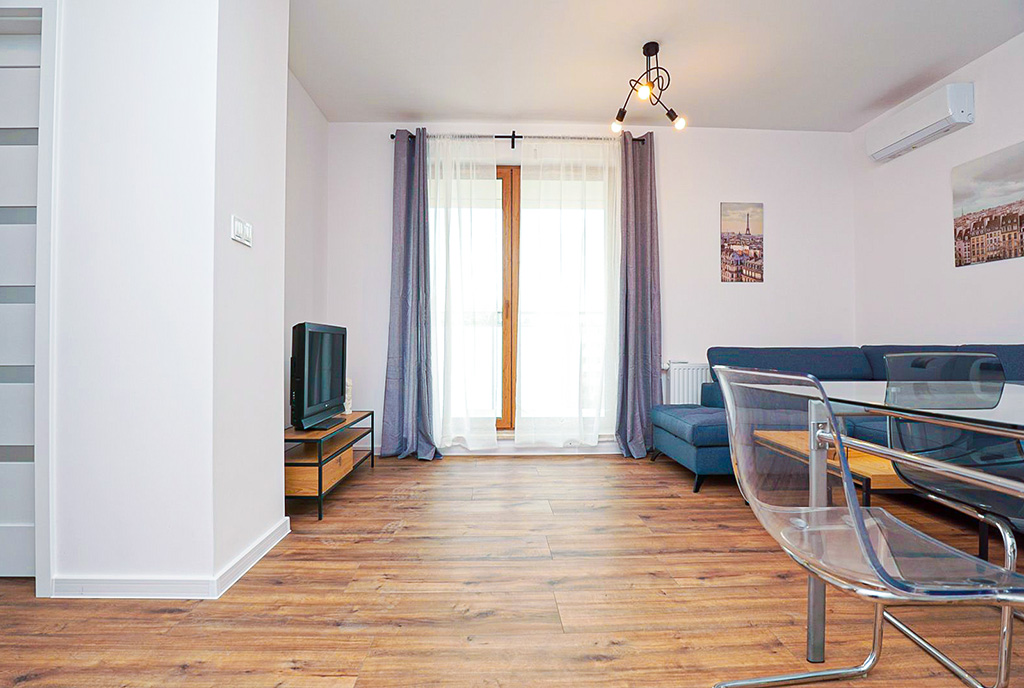 zbliżenie na pokój gościnny w luksusowym apartamencie na sprzedaż Piotrków Trybunalski