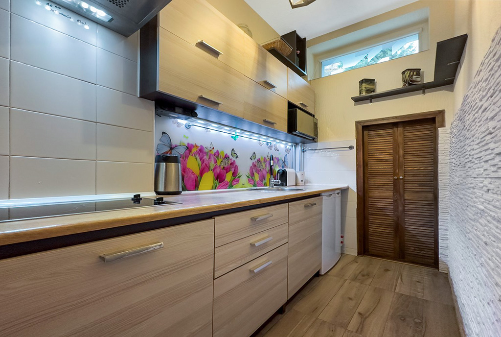 nowoczesne oświetlenie kuchni w ekskluzywnym apartamencie na sprzedaż Kraków