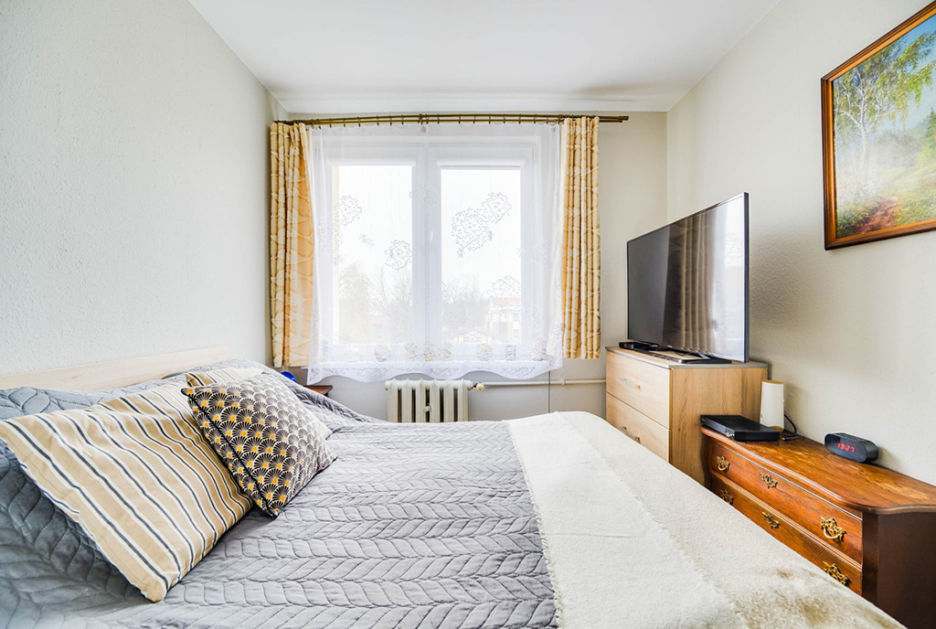 zaciszna sypialnia w ekskluzywnym apartamencie na sprzedaż Malbork