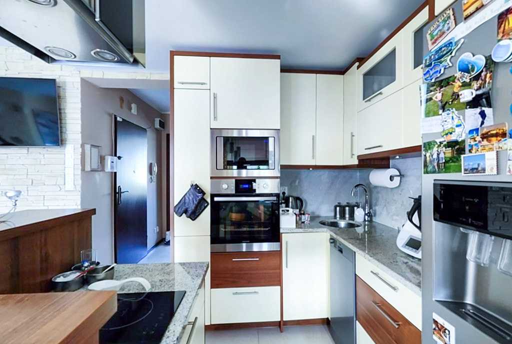 zbliżenie na kuchnię w luksusowym apartamencie na sprzedaż Ełk