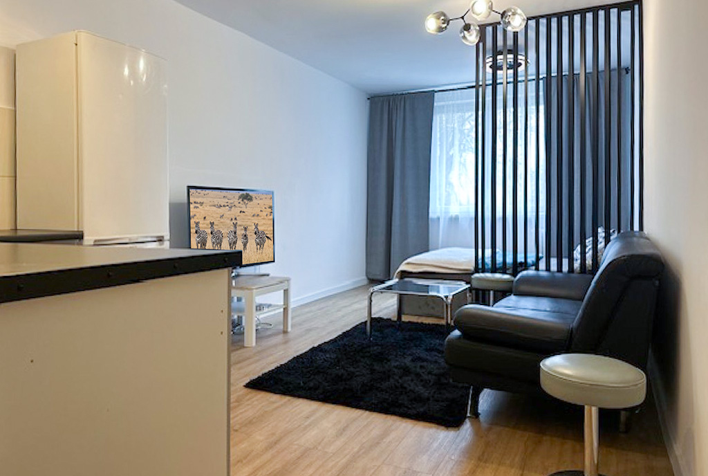 nowoczesny pokój dzienny w ekskluzywnym apartamencie do sprzedaży Malbork