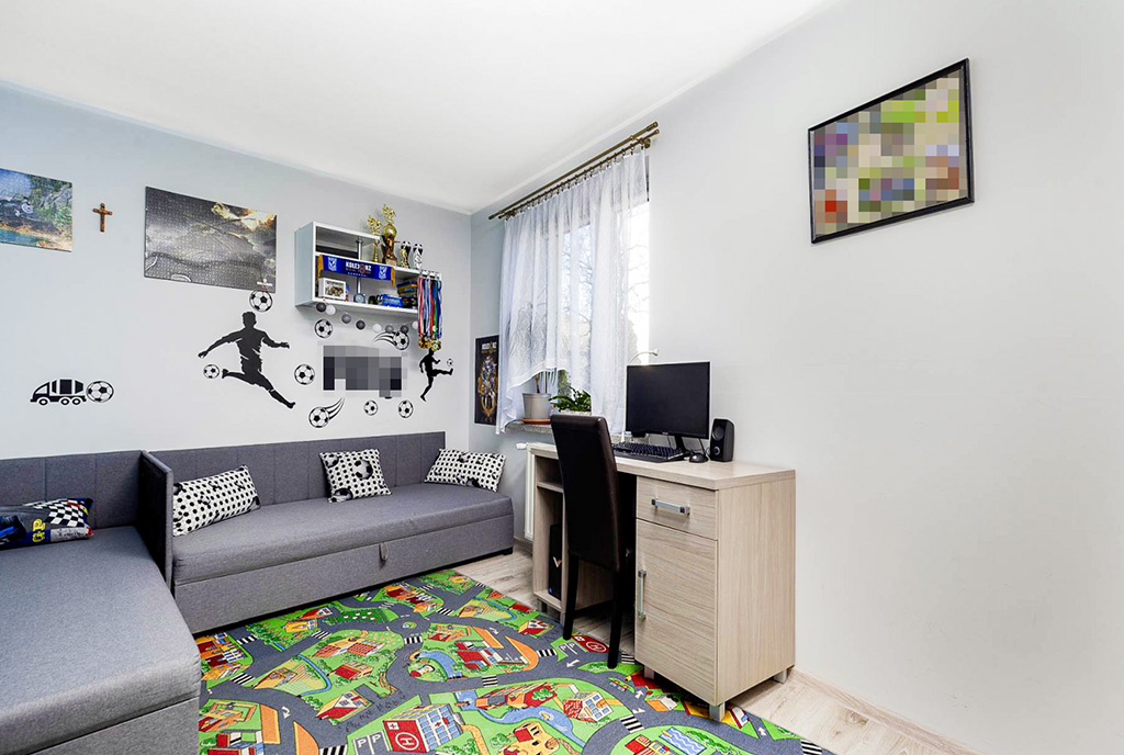 na zdjęciu jeden z pokoi w ekskluzywnym apartamencie na sprzedaż Poznań