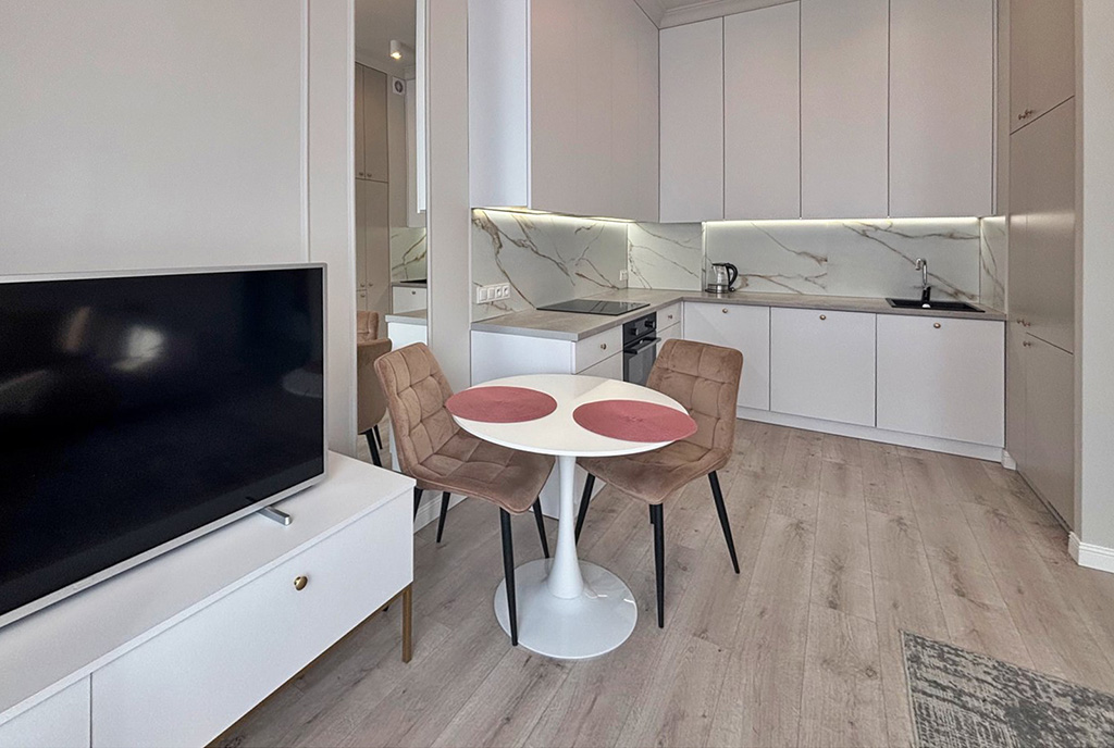 fragment kuchni z jadalnią w luksusowym apartamencie do wynajmu Szczecin