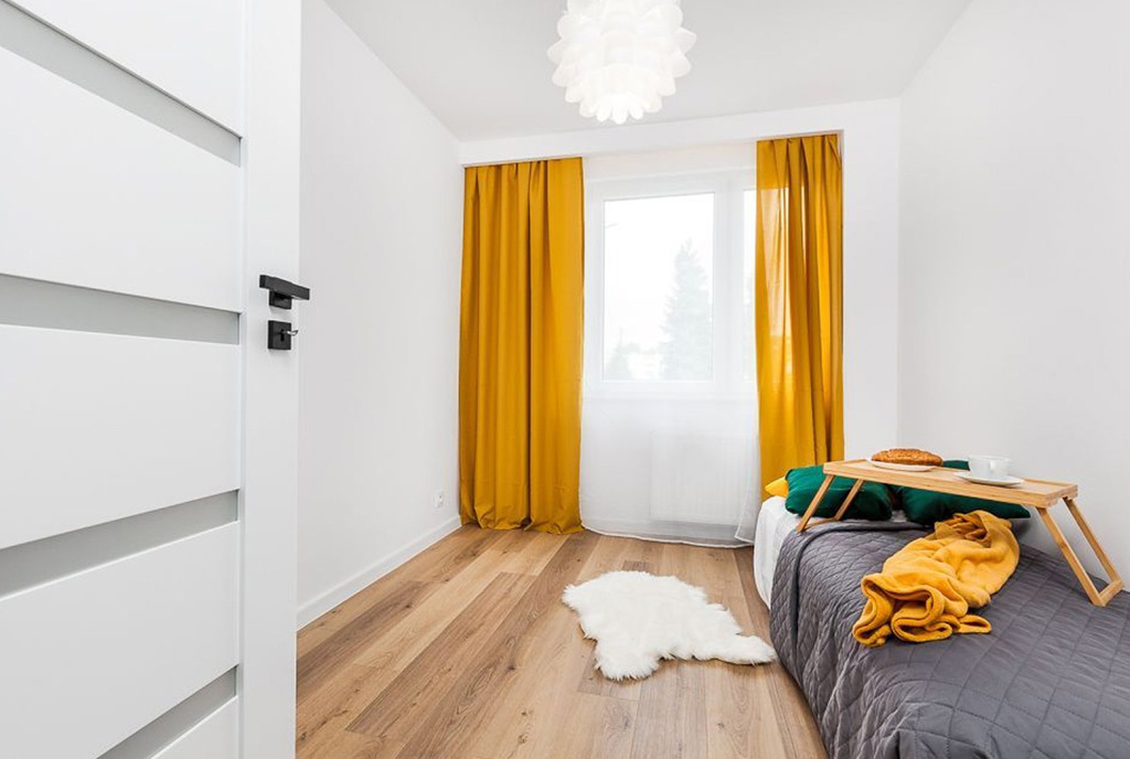 na zdjęciu sypialnia w luksusowym apartamencie na sprzedaż Gdańsk