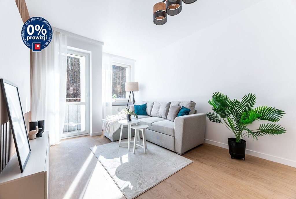 widok z kuchni na salon w luksusowym apartamencie na sprzedaż Gdynia okolice