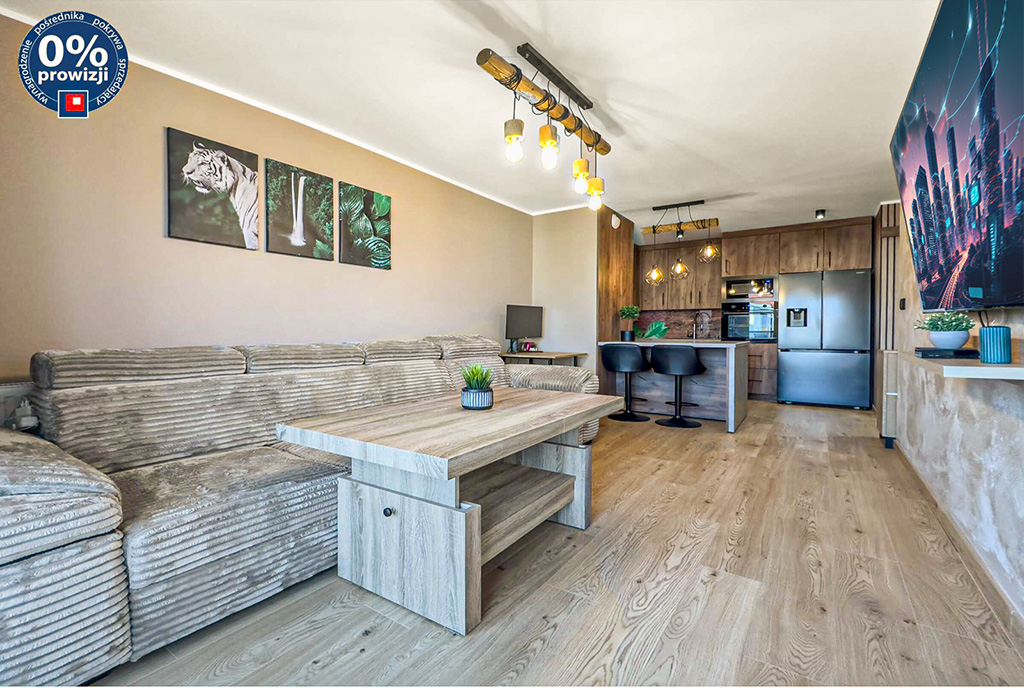 widok z salonu na aneks kuhenny w ekskluzywnym apaeramencie do sprzedaży Katowice okolice