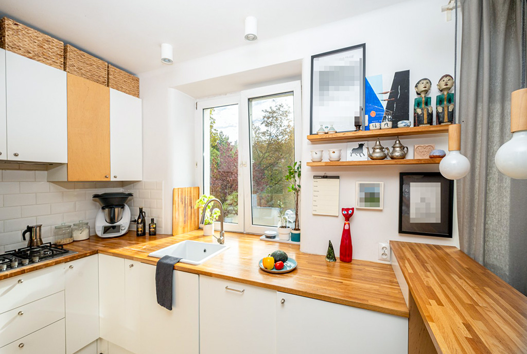 zadbana kuchnia w luksusowym apartamencie na sprzedaż Warszawa