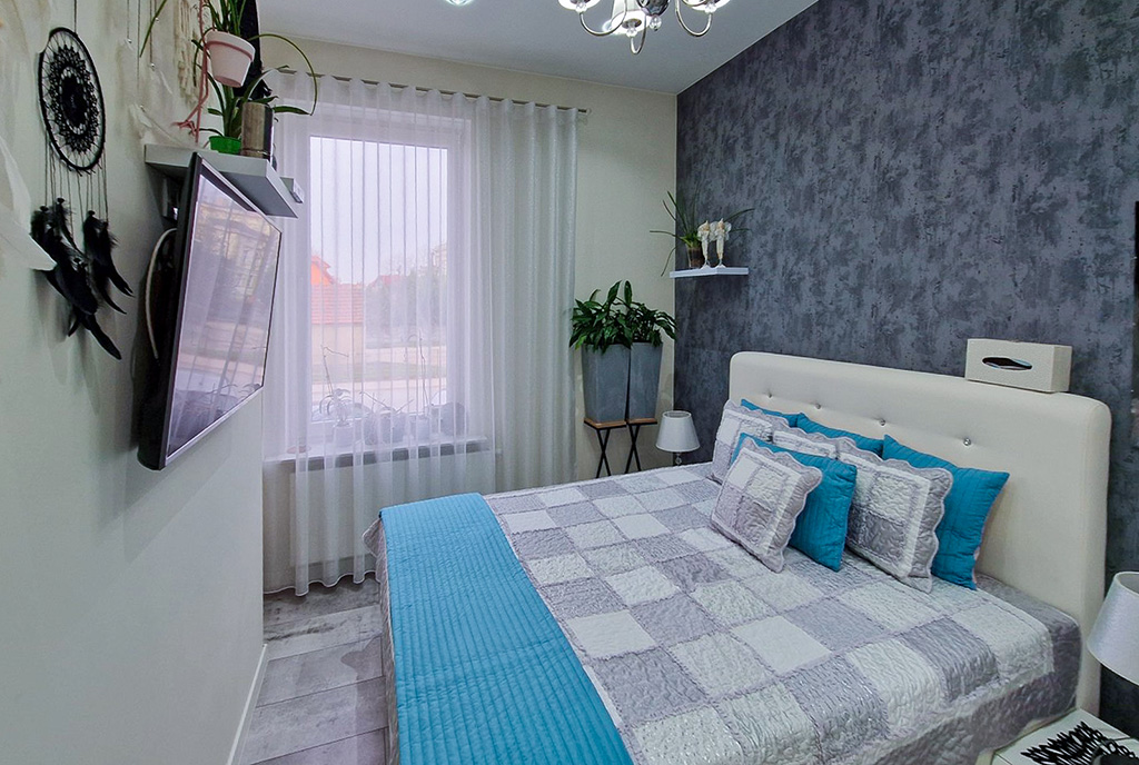 na zdjęciu komfortowa sypialnia w ekskluzywnym apartamencie na sprzedaż Zielona Góra okolice