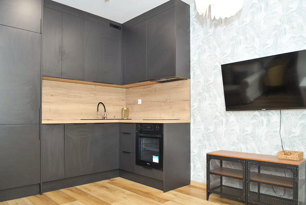 imponujący aneks kuchenny w luksusowym apartamencie do wynajmu Szczecin