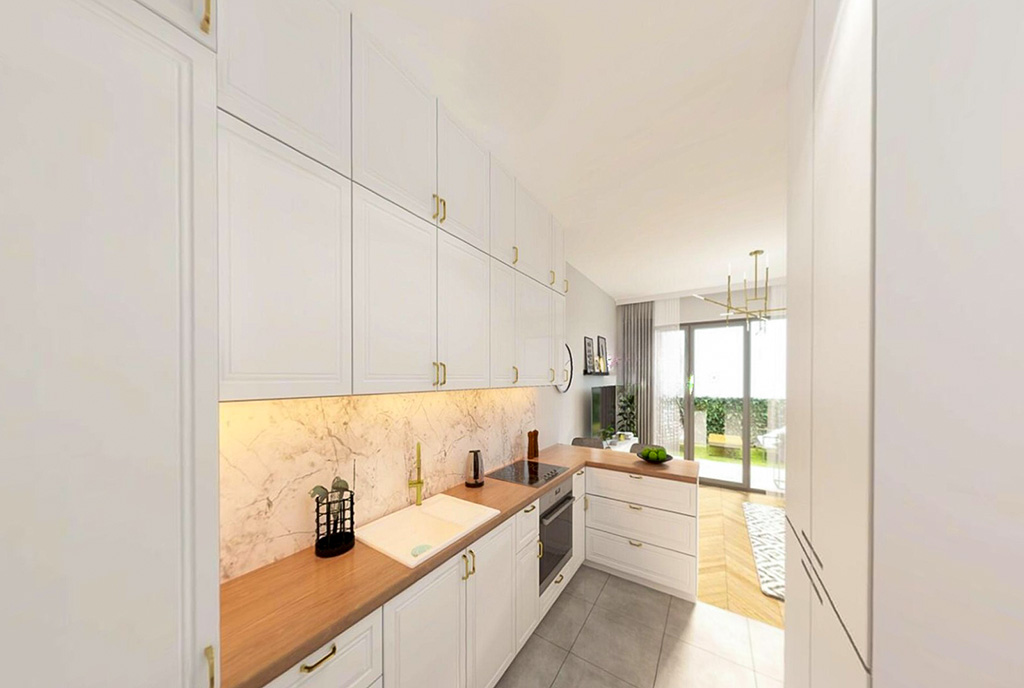zaprojektowana w bieli kuchnia w luksusowym apartamencie na sprzedaż Gdańsk