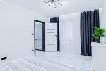 zaciszna sypialnia w ekskluzywnym apartamencie na sprzedaż Kalisz