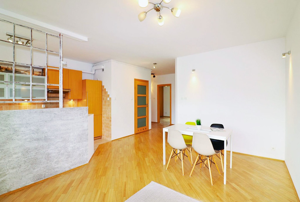 jadalnia i aneks kuchenny w luksusowym apartamencie n sprzedaż Warszawa