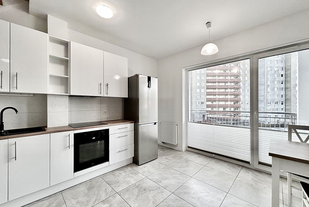 zbliżenie na kuchnię w luksusowym apartamencie na sprzedaż Słupsk