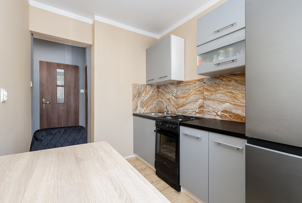 zadbana kuchnia w ekskluzywnym apartamencie na sprzedaż Szczecin