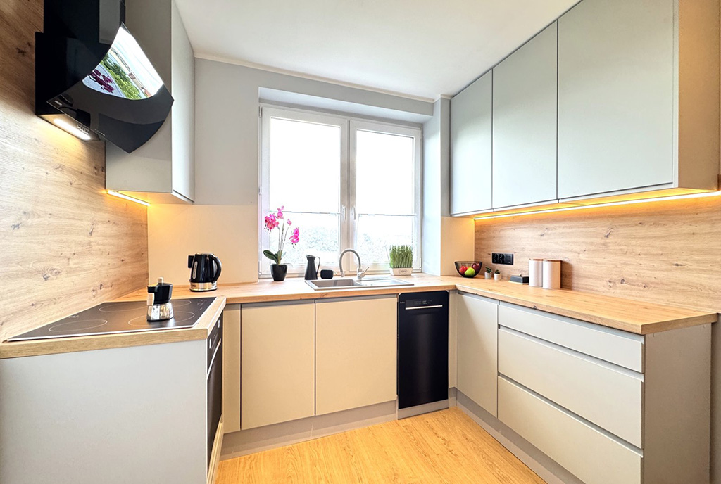 zbliżenie na aneks kuchenny w luksusowym apartamencie na sprzedaż Ostrów Wielkopolski