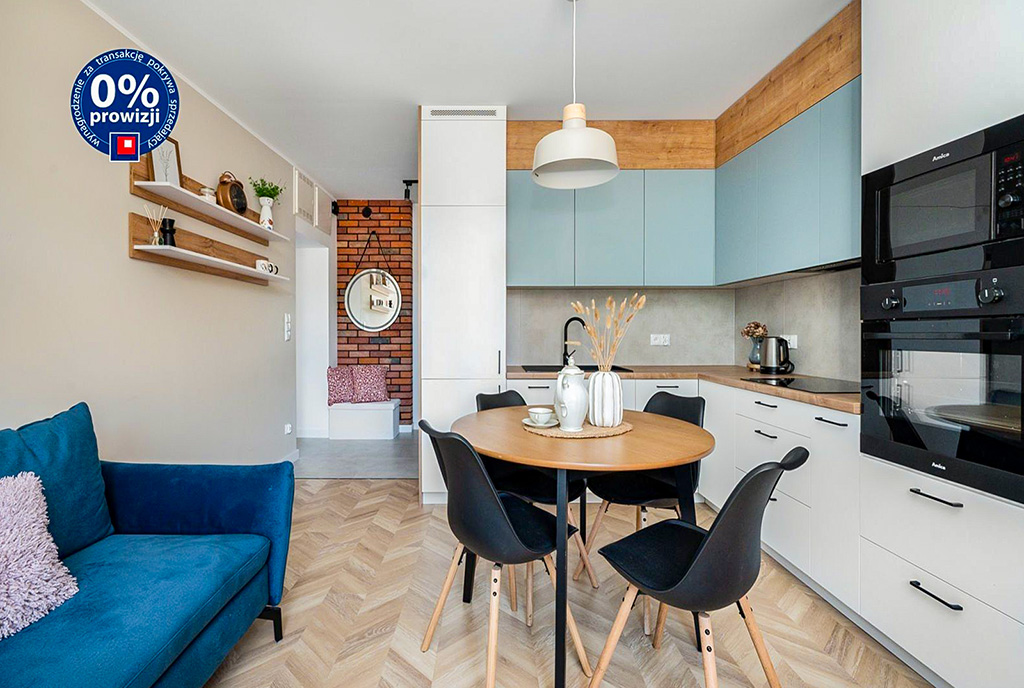 zbliżenie na jadalnię i kuchnię w luksusowym apartamencie na sprzedaż Gdynia (okolice)