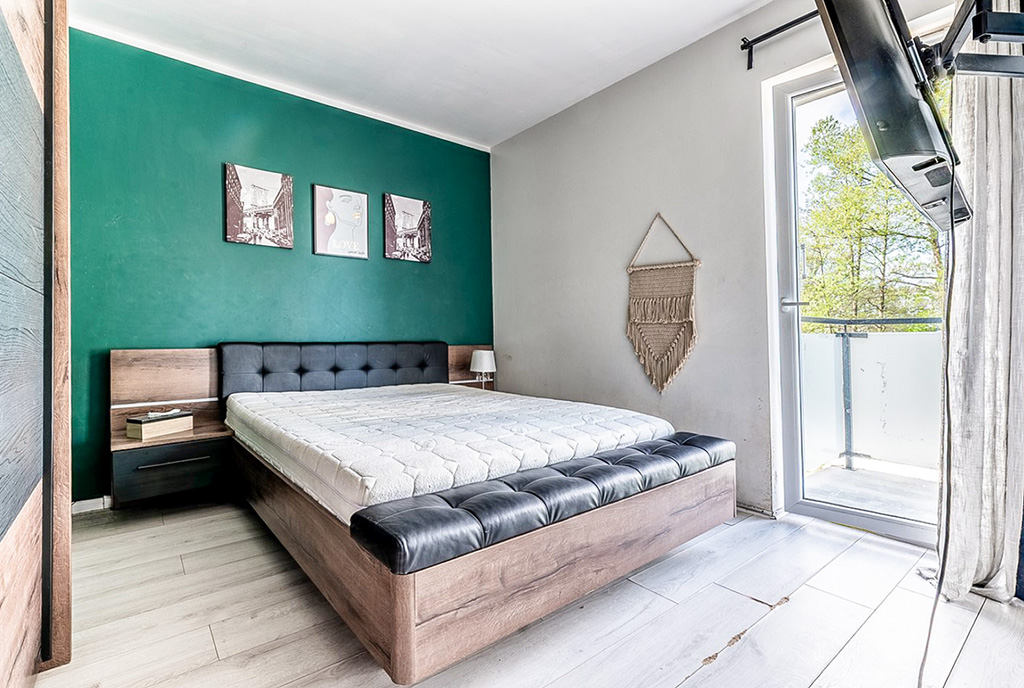 okazała sypialnia w ekskluzywnym apartamencie na sprzedaż Gdynia okolice