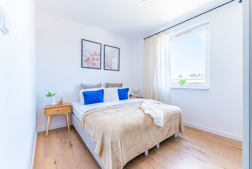 elegancka sypialnia w ekskluzywnym apartamencie na sprzedaż Gdynia okolice