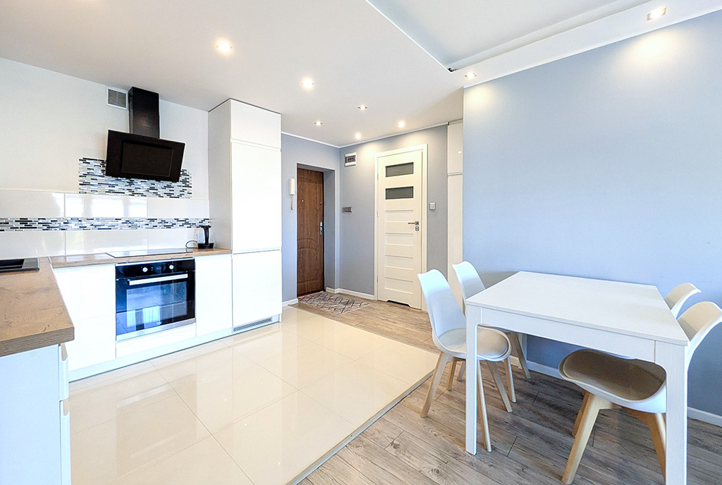 zbliżenie na kuchnię w luksusowym apartamencie na sprzedaż Ostrów Wielkopolski