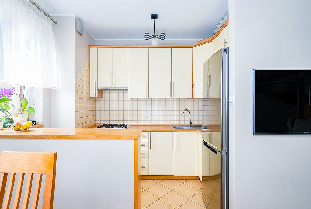 zbliżenie a aneks kuchenny w luksusowym apartamencie na sprzedaż Poznań