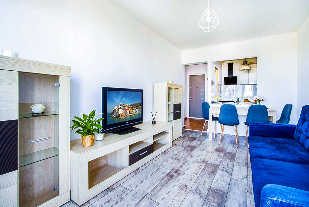 elegancki pokój dzienny w ekskluzywnym apartamencie do sprzedaży Poznań