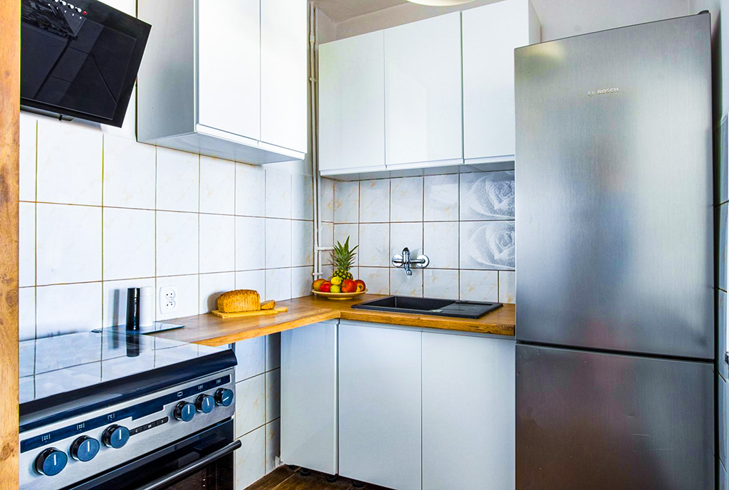 na zdjęciu kuchnia w ekskluzywnym apartamencie na sprzedaż Poznań