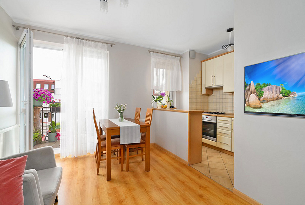 fragment salonu w ekskluzywnym apartamencie do sprzedaży Poznań