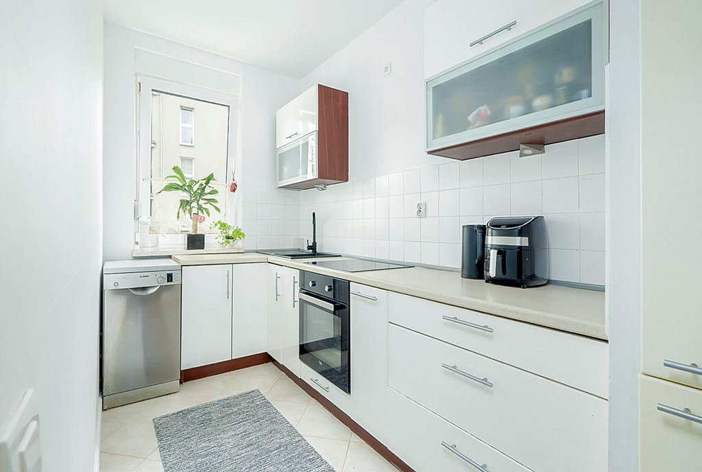 fragment kuchni w ekskluzywnym apartamencie na sprzedaż Poznań