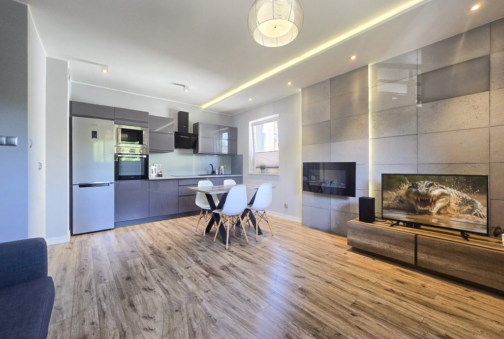 nowoczesny pokój dzienny w ekskluzywnym apartamencie do sprzedaży Wisła