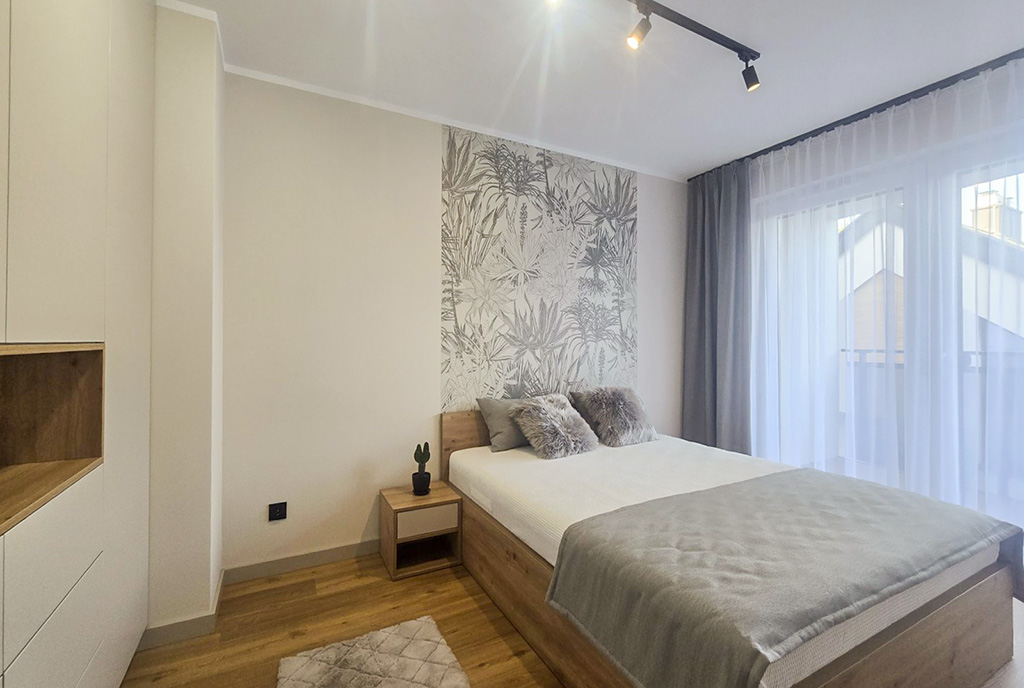 zbliżenie na sypialnię w ekskluzywnym apartamencie na sprzedaż Wisła