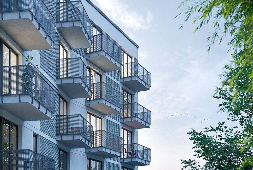 zbliżenie na apartamentowiec, gdzie znajdziemy ekskluzywny apartament do sprzedaży Gdańsk