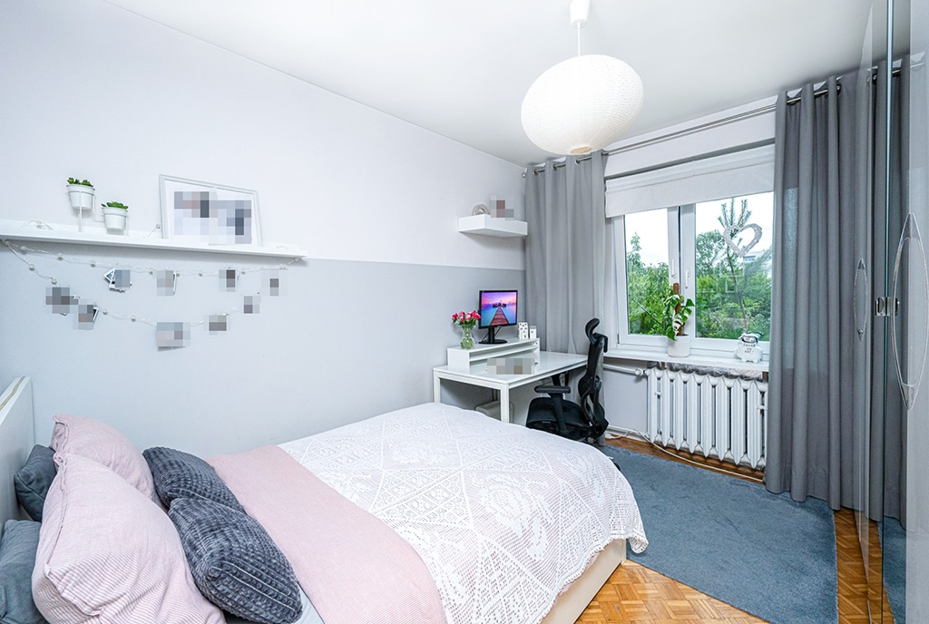 zaciszna sypialnia w ekskluzywnym apartamencie na sprzedaż Warszawa (okolice)