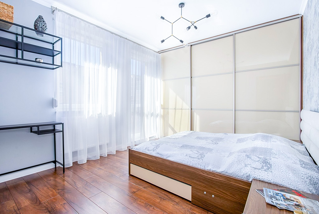 zaciszna sypialnia w luksusowym apartamencie na sprzedaż Poznań