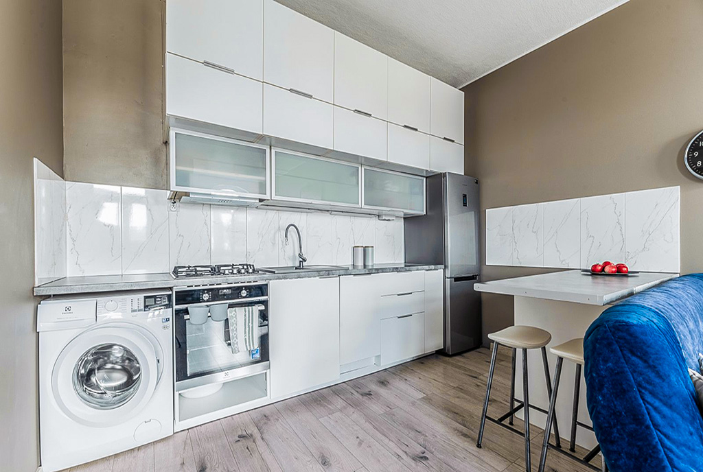 zbliżenie na kuchnię w luksusowym apartamencie na sprzedaż Gdynia okolice
