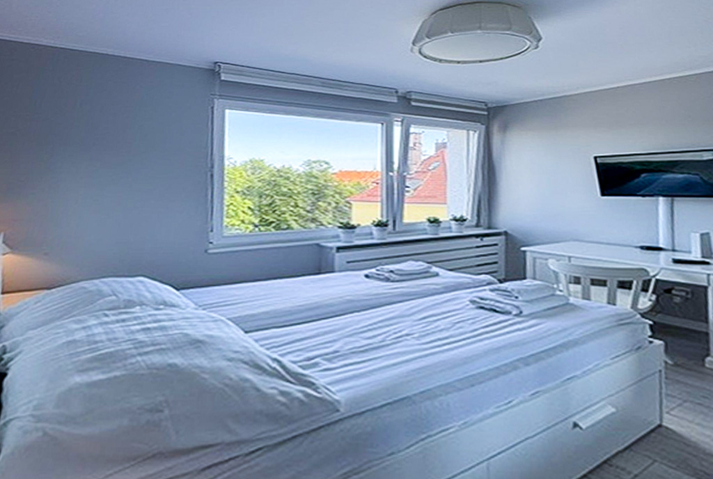 zaciszna sypialnia w ekskluzywnym apartamencie na sprzedaż Sopot