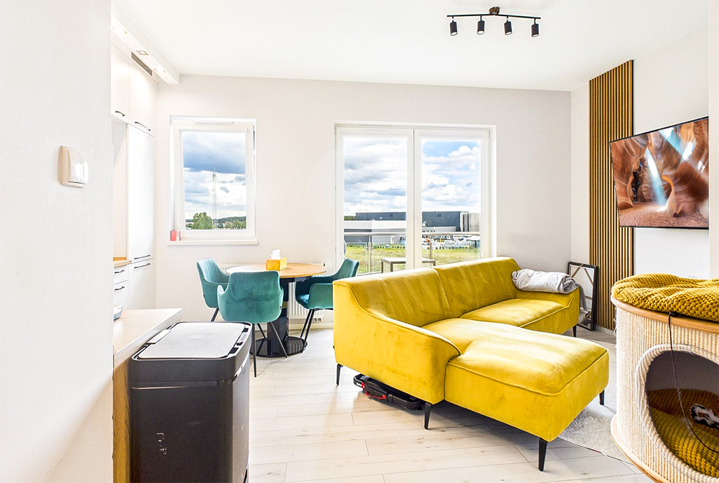 nowoczesny salon w ekskluzywnym apartamencie do sprzedaży Toruń okolice