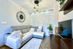 na zdjęciu pokój gościnny w ekskluzywnym apartamencie na sprzedaż Wrocław okolice