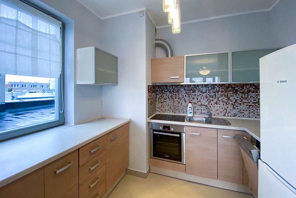 na zdjęciu kuchnia w luksusowym apartamencie do wynajmu Szczecin