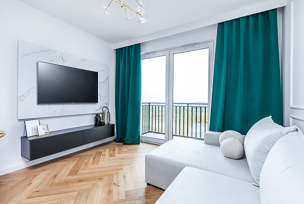 druga strona pokoju dziennego w luksusowym apartamencie na sprzedaż Gdańsk