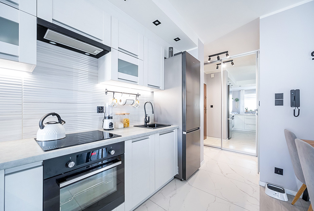 komfortowa kuchnia w luksusowym apartamencie na sprzedaż Gdynia okolice
