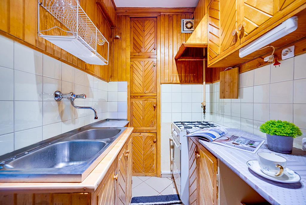 komfortowa kuchnia w luksusowym apartamencie na sprzedaż Sopot