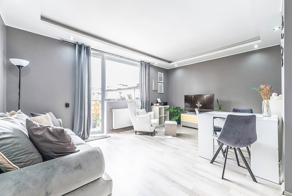 na zdjęciu pokój dzienny w ekskluzywnym apartamencie do sprzedaży Gdynia okolice