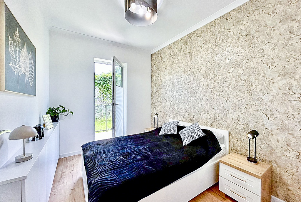 zbliżenie na sypialnię w luksusowym apartamencie do wynajmu Słupsk