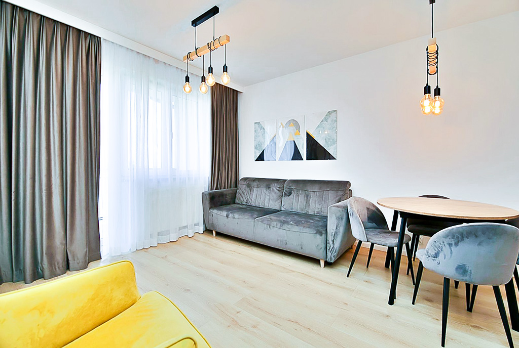 na zdjęciu pokój gościnny w luksusowym apartamencie na sprzedaż Gorzów Wielkopolski
