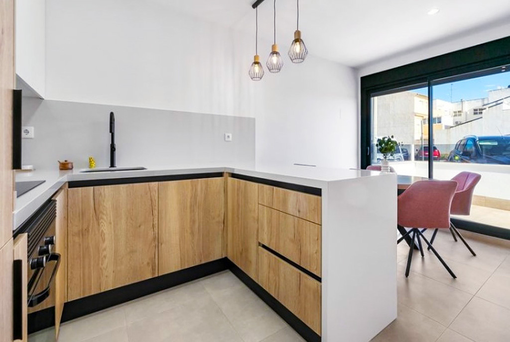 gustownie zaaranżowana kuchnia w luksusowym apartamencie na sprzedaż Hiszpania Santiago de la Ribera