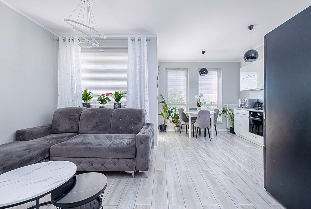 na zdjęciu pokój dzienny w luksusowym apartamencie na sprzedaż Szczecin