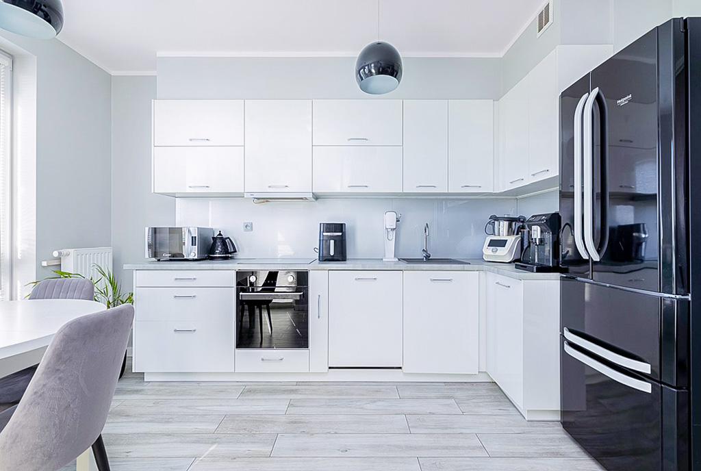 zbliżenie na kuchnię w ekskluzywnym apartamencie na sprzedaż Szczecin