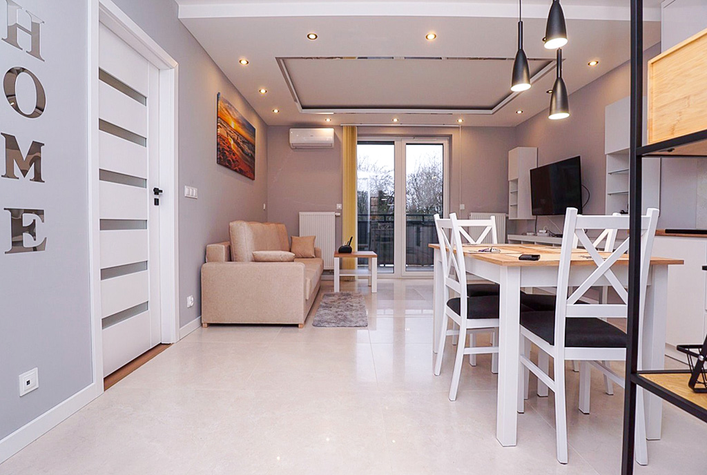 widok na pokój dzienny w luksusowym apartamencie do wynajmu Piotrków Trybunalski