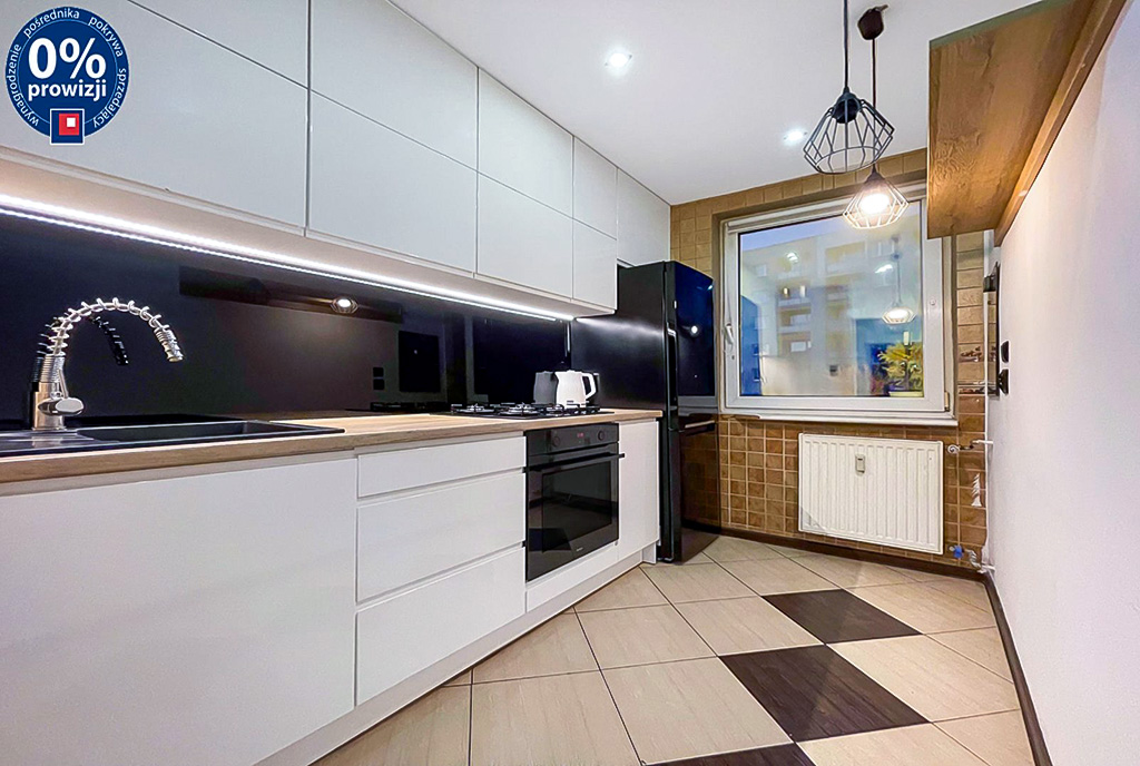 zaaranżowana w bieli kuchnia w luksusowym apartamencie na sprzedaż Katowice okolice