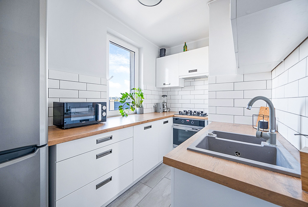zabudowana kuchnia w ekskluzywnym apartamencie na wynajem Gdynia